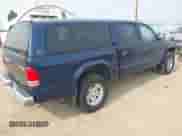 2002 Dodge Dakota SLT z VIN 1B7HG48NX2S682849, wystawiony jako IAAI lot #43032345 z przebiegiem 192 599 mil mil oraz . Historia ofert i sprzedaży dostępna na DreamBid. Obrazek 4.