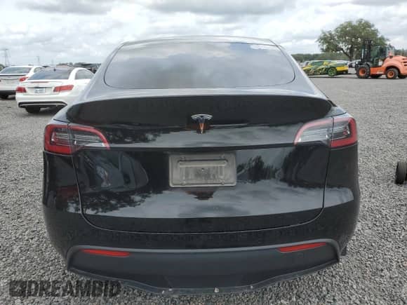 2021 Tesla Model Y Long Range with VIN 5YJYGAEE9MF188372, listed as a Copart auction lot 56622453 with 44,265 mi miles and Salvage title. Bid and sale history available at DreamBid. Image 6.