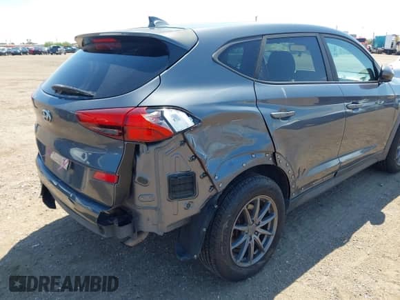 2019 Hyundai Tucson SE z VIN KM8J23A40KU916007, wystawiony jako IAAI lot #43043749 z przebiegiem 132 109 mil mil oraz . Historia ofert i sprzedaży dostępna na DreamBid. Obrazek 6.