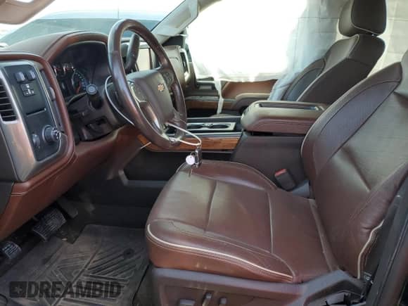 2015 Chevrolet Silverado 1500 High Country z VIN 3GCPCTECXFG352050, wystawiony jako Copart lot #66741964 z przebiegiem Nie podano mil oraz Szkoda całkowita • Salvage title. Historia ofert i sprzedaży dostępna na DreamBid. Obrazek 7.