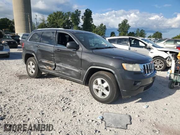 2011 Jeep Grand Cherokee Laredo с VIN 1J4RR4GG4BC590030, выставлен на аукционе Copart как лот 70199405 с пробегом 204 419 миль миль и Списание • Salvage title. История ставок и продаж доступна на DreamBid. Изображение 4.