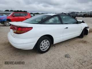 2000 Saturn SC with VIN 1G8ZP1283YZ160659, listed as a Copart auction lot 80305285 with Not provided miles and Clean title. Bid and sale history available at DreamBid. Image 3.