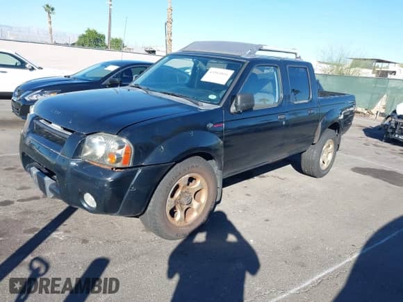 2001 Nissan Frontier SC SuperCharger with VIN 1N6MD27Y71C390198, listed as a IAAI auction lot 43564816 with 181,730 mi miles and . Bid and sale history available at DreamBid. Image 2.