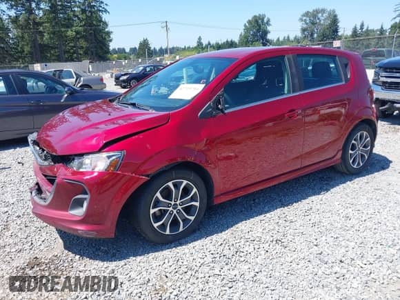 2018 Chevrolet Sonic LT with VIN 1G1JD6SG1J4120415, listed as a IAAI auction lot 42719704 with 96,341 mi miles and . Bid and sale history available at DreamBid. Image 2.