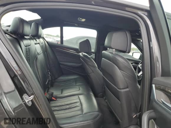 2018 BMW 5 Series M550i xDrive with VIN WBAJB9C53JB286164, listed as a Copart auction lot 71052315 with 91,157 mi miles and Clean title. Bid and sale history available at DreamBid. Image 10.