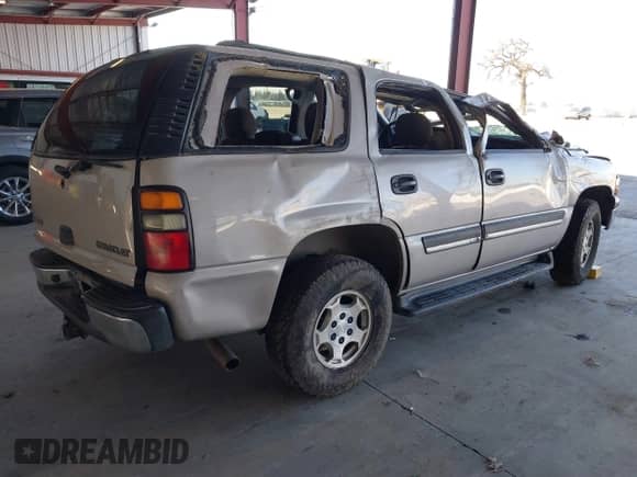 2005 Chevrolet Tahoe LS with VIN 1GNEC13T65J172986, listed as a IAAI auction lot 41449674 with 252,129 mi miles and . Bid and sale history available at DreamBid. Image 4.