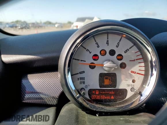 2012 MINI Hardtop S with VIN WMWSV3C50CTY25944, listed as a Copart auction lot 62837575 with 73,618 mi miles and Salvage title. Bid and sale history available at DreamBid. Image 9.