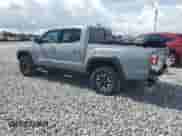 2021 Toyota Tacoma SR5 with VIN 3TMAZ5CN9MM148312, listed as a Copart auction lot 63611885 with 95,209 mi miles and Salvage title. Bid and sale history available at DreamBid. Image 2.