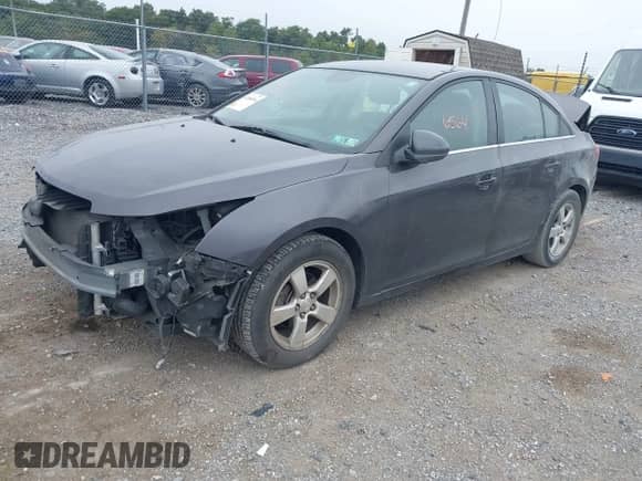 2014 Chevrolet Cruze 1LT with VIN 1G1PC5SB8E7338769, listed as a IAAI auction lot 43186564 with 115,065 mi miles and . Bid and sale history available at DreamBid. Image 2.