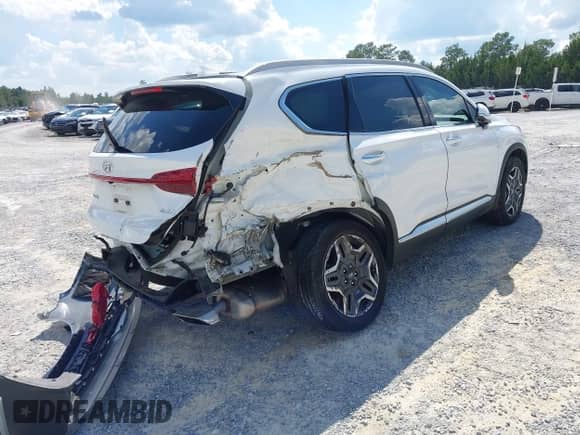 2023 Hyundai Santa Fe Limited with VIN 5NMS44AL0PH633816, listed as a IAAI auction lot 43324554 with 31,271 mi miles and . Bid and sale history available at DreamBid. Image 4.