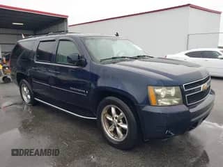 2007 Chevrolet Suburban LT z VIN 1GNFC16067R276582, wystawiony jako IAAI lot #41494768 z przebiegiem 300 791 mil mil oraz . Historia ofert i sprzedaży dostępna na DreamBid. Obrazek 1.
