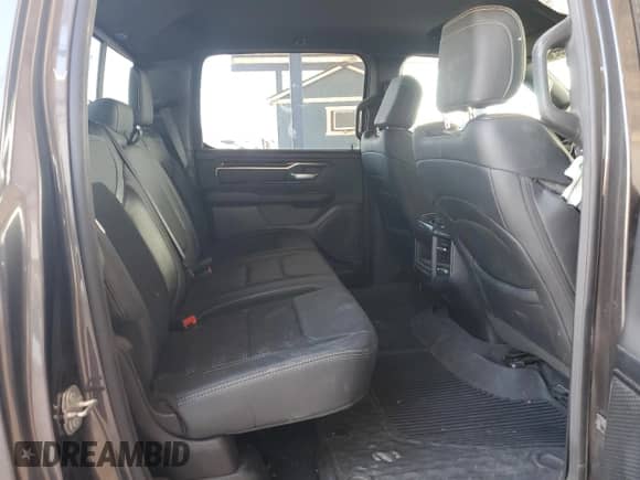 2020 Ram 1500 Rebel z VIN 1C6SRFLT4LN385004, wystawiony jako Copart lot #81076245 z przebiegiem 74 355 mil mil oraz Szkoda całkowita • Salvage title. Historia ofert i sprzedaży dostępna na DreamBid. Obrazek 10.