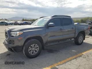 2019 Toyota Tacoma SR5 with VIN 5TFAZ5CN1KX086783, listed as a Copart auction lot 70166865 with 62,838 mi miles and Salvage title. Bid and sale history available at DreamBid. Image 1.