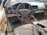 2002 Mercedes-Benz SL 500 with VIN WDBFA68F72F203503, listed as a Copart auction lot 49415215 with 107,210 mi miles and Salvage title. Bid and sale history available at DreamBid. Image 8.