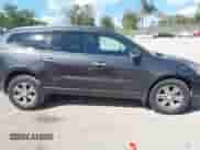 2016 Chevrolet Traverse LT z VIN 1GNKRGKD1GJ293992, wystawiony jako IAAI lot #43151878 z przebiegiem 121 506 mil mil oraz . Historia ofert i sprzedaży dostępna na DreamBid. Obrazek 13.