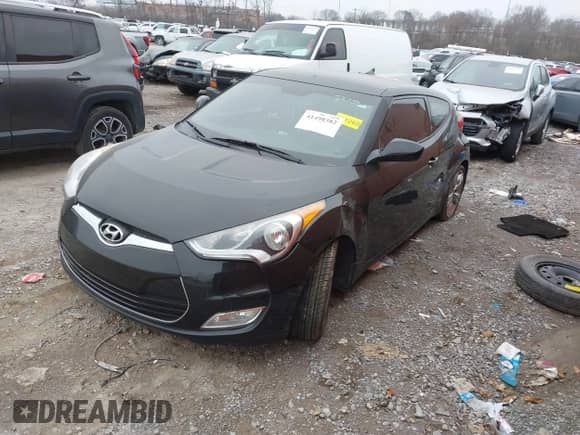 2014 Hyundai Veloster with VIN KMHTC6AD6EU182596, listed as a IAAI auction lot 41498382 with 99,376 mi miles and . Bid and sale history available at DreamBid. Image 17.