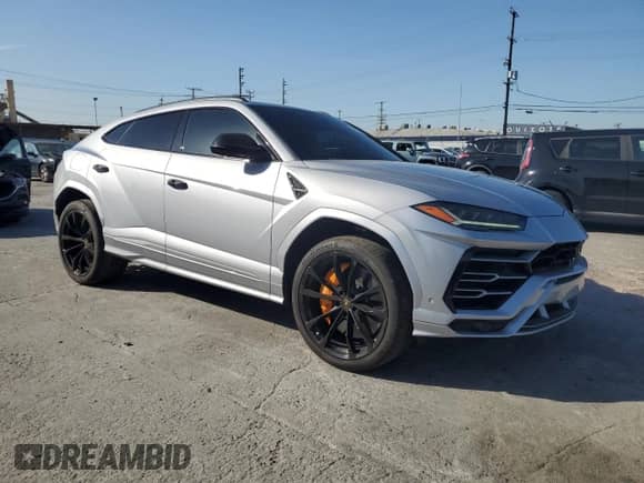 2019 Lamborghini Urus с VIN ZPBUA1ZLXKLA03290, выставлен на аукционе Copart как лот 52026695 с пробегом 20 414 миль миль и Списание • Salvage title. История ставок и продаж доступна на DreamBid. Изображение 4.
