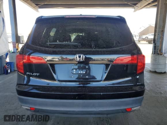 2017 Honda Pilot EX-L with VIN 5FNYF5H52HB017345, listed as a Copart auction lot 80751765 with 129,760 mi miles and Salvage title. Bid and sale history available at DreamBid. Image 6.