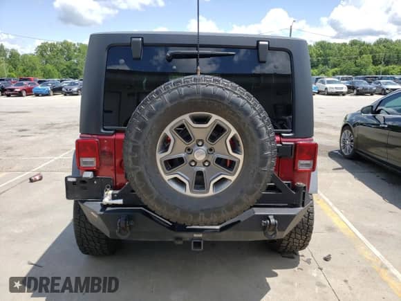 2013 Jeep Wrangler Rubicon 10th Anniversary with VIN 1C4BJWCG6DL508396, listed as a Copart auction lot 61451255 with 125,138 mi miles and Salvage title. Bid and sale history available at DreamBid. Image 6.
