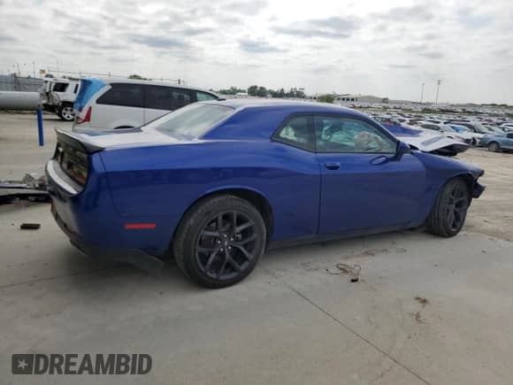 2021 Dodge Challenger SXT with VIN 2C3CDZAG5MH646299, listed as a Copart auction lot 71701895 with Not provided miles and Salvage title. Bid and sale history available at DreamBid. Image 3.