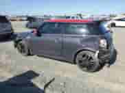 2016 MINI Hardtop John Cooper Works with VIN WMWXM9C53GT997497, listed as a Copart auction lot 56387615 with 59,852 mi miles and Salvage title. Bid and sale history available at DreamBid. Image 2.