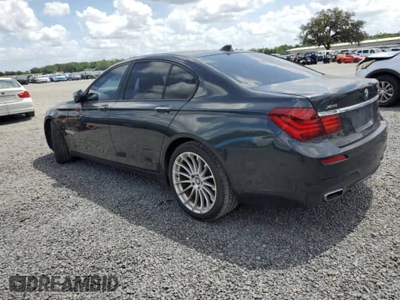 2012 BMW 7 Series 750i xDrive with VIN WBAKC6C5XCC397243, listed as a Copart auction lot 51331165 with 77,424 mi miles and Clean title. Bid and sale history available at DreamBid. Image 2.