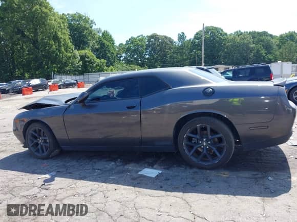 2023 Dodge Challenger SXT with VIN 2C3CDZAG1PH654517, listed as a IAAI auction lot 42600570 with 34,214 mi miles and . Bid and sale history available at DreamBid. Image 14.