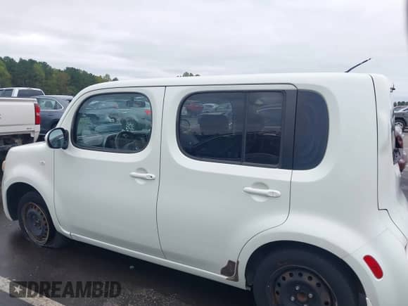 2010 Nissan Cube S z VIN JN8AZ2KR7AT167462, wystawiony jako IAAI lot #43433876 z przebiegiem 159 380 mil mil oraz . Historia ofert i sprzedaży dostępna na DreamBid. Obrazek 14.