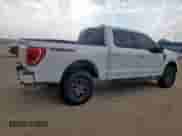 2023 Ford F-150 XL with VIN 1FTEW1E83PFB44870, listed as a Copart auction lot 67404595 with 69,006 mi miles and Salvage title. Bid and sale history available at DreamBid. Image 3.