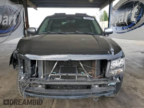 2007 Chevrolet Suburban LT with VIN 3GNFK16357G258782, listed as a Copart auction lot 70554445 with 193,228 mi miles and Salvage title. Bid and sale history available at DreamBid. Image 5.