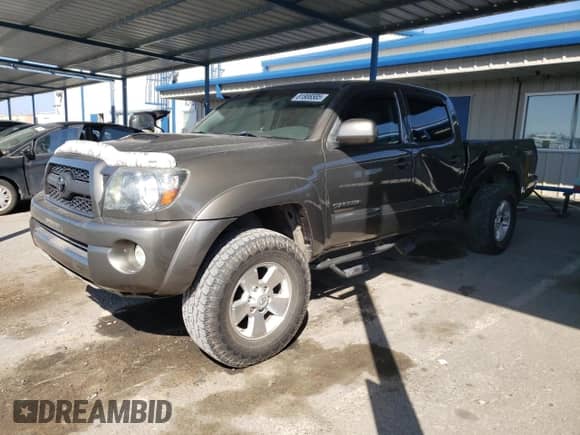 2011 Toyota Tacoma with VIN 5TFMU4FN6BX002359, listed as a Copart auction lot 81808585 with 151,055 mi miles and Salvage title. Bid and sale history available at DreamBid. Image 1.