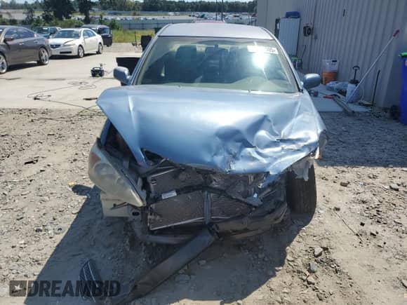 2004 Toyota Camry LE z VIN 4T1BF32KX4U570301, wystawiony jako Copart lot #71390505 z przebiegiem 264 810 mil mil oraz Szkoda całkowita • Salvage title. Historia ofert i sprzedaży dostępna na DreamBid. Obrazek 5.