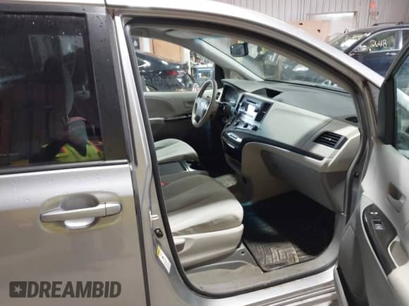 2012 Toyota Sienna LE AAS with VIN 5TDKK3DC1CS253502, listed as a IAAI auction lot 43380424 with 157,876 mi miles and . Bid and sale history available at DreamBid. Image 5.