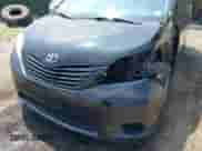 2014 Toyota Sienna L with VIN 5TDZK3DC8ES463757, listed as a IAAI auction lot 42915919 with 95,252 mi miles and . Bid and sale history available at DreamBid. Image 6.