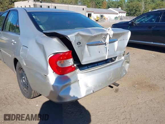 2004 Toyota Camry LE with VIN 4T1BE30K14U369733, listed as a IAAI auction lot 43410581 with 239,383 mi miles and . Bid and sale history available at DreamBid. Image 6.