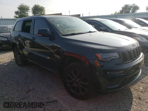 2018 Jeep Grand Cherokee Overland z VIN 1C4RJFCG7JC203502, wystawiony jako Copart lot #67731494 z przebiegiem 149 185 mil mil oraz Czysty tytuł • Clean title. Historia ofert i sprzedaży dostępna na DreamBid. Obrazek 4.