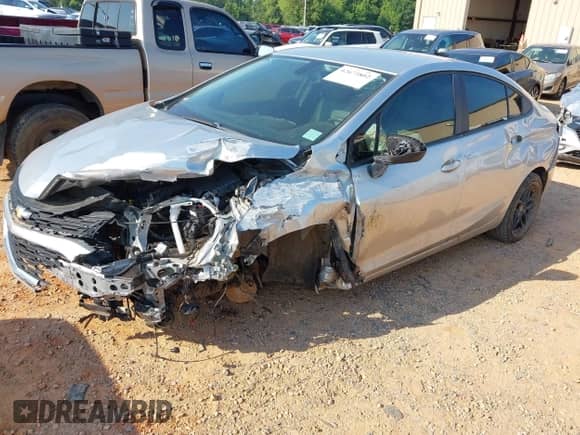 2018 Chevrolet Cruze LS with VIN 1G1BC5SM3J7237273, listed as a IAAI auction lot 42673802 with 103,633 mi miles and . Bid and sale history available at DreamBid. Image 2.