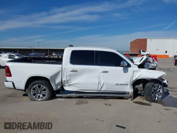 2022 Ram 1500 Longhorn with VIN 1C6SRFKT9NN310304, listed as a IAAI auction lot 41333349 with 40,055 mi miles and . Bid and sale history available at DreamBid. Image 14.