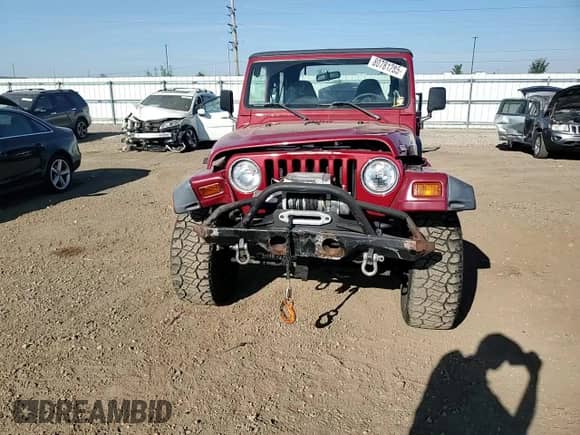 1999 Jeep Wrangler Sport z VIN 1J4FY19S8XP480961, wystawiony jako Copart lot #80781285 z przebiegiem 113 713 mil mil oraz Szkoda całkowita • Salvage title. Historia ofert i sprzedaży dostępna na DreamBid. Obrazek 13.
