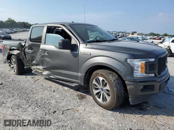 2019 Ford F-150 XL with VIN 1FTEW1C47KKD54596, listed as a Copart auction lot 69421275 with 98,032 mi miles and Salvage title. Bid and sale history available at DreamBid. Image 4.