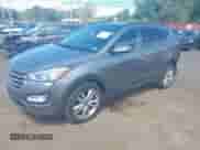 2015 Hyundai Santa Fe z VIN 5XYZWDLA4FG262429, wystawiony jako IAAI lot #43118323 z przebiegiem 105 391 mil mil oraz . Historia ofert i sprzedaży dostępna na DreamBid. Obrazek 2.