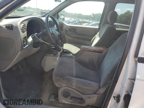 2003 Chevrolet TrailBlazer LT with VIN 1GNDS13S032117561, listed as a Copart auction lot 61864335 with 235,124 mi miles and Salvage title. Bid and sale history available at DreamBid. Image 7.