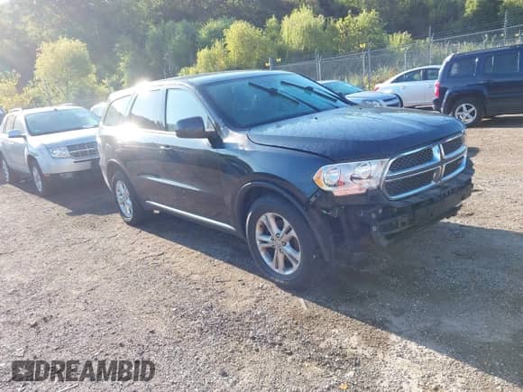 2013 Dodge Durango SXT with VIN 1C4RDJAG1DC695624, listed as a IAAI auction lot 43134491 with 219,799 mi miles and . Bid and sale history available at DreamBid. Image 1.