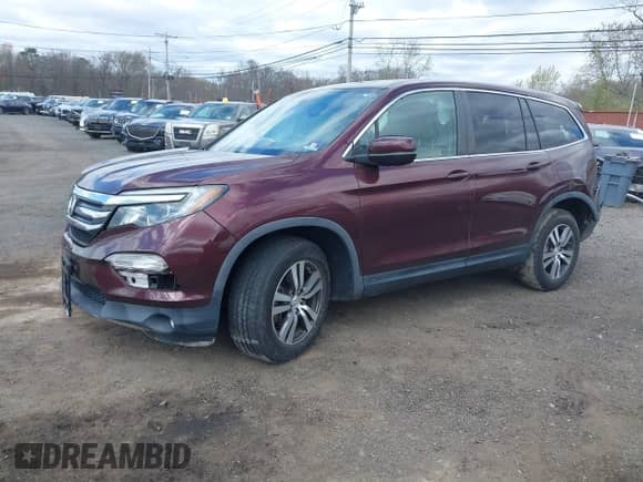 2017 Honda Pilot EX-L with VIN 5FNYF6H74HB040889, listed as a IAAI auction lot 42040094 with 84,001 mi miles and . Bid and sale history available at DreamBid. Image 2.