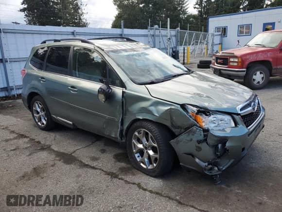 2015 Subaru Forester Touring with VIN JF2SJAWC5FH594724, listed as a Copart auction lot 84658235 with 72,361 mi miles and Salvage title. Bid and sale history available at DreamBid. Image 4.