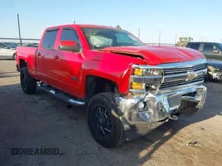 2016 Chevrolet Silverado 2500HD LT z VIN 1GC1KVEG2GF243270, wystawiony jako IAAI lot #41950530 z przebiegiem 131 939 mil mil oraz . Historia ofert i sprzedaży dostępna na DreamBid. Obrazek 1.