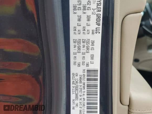 2012 Jeep Grand Cherokee Limited z VIN 1C4RJFBG8CC300891, wystawiony jako Copart lot #84041155 z przebiegiem 141 239 mil mil oraz Czysty tytuł • Clean title. Historia ofert i sprzedaży dostępna na DreamBid. Obrazek 13.