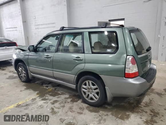 2007 Subaru Forester X L.L. Bean with VIN JF1SG67697H739094, listed as a Copart auction lot 58479625 with 249,539 mi miles and Salvage title. Bid and sale history available at DreamBid. Image 2.
