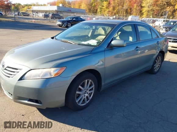 2007 Toyota Camry LE with VIN JTNBE46K173068998, listed as a IAAI auction lot 43456724 with 307,464 mi miles and . Bid and sale history available at DreamBid. Image 2.