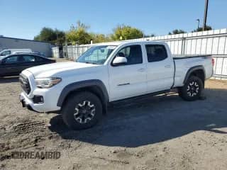 2016 Toyota Tacoma SR5 z VIN 3TMDZ5BN6GM007815, wystawiony jako Copart lot #85360485 z przebiegiem 148 477 mil mil oraz Szkoda całkowita • Salvage title. Historia ofert i sprzedaży dostępna na DreamBid. Obrazek 1.